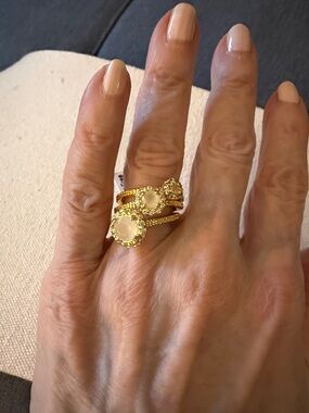 NWT Gold Tone Stacking Rings (3) with round cabochons in a Halo Setting. Size 7.